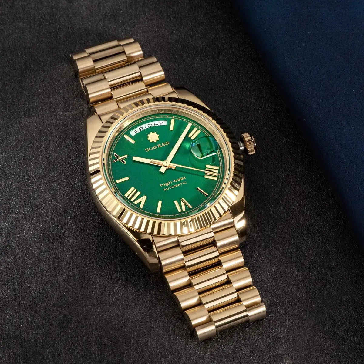 Sugess men's gold-tone 40mm wristwatch with green dial, date and day window, sapphire glass