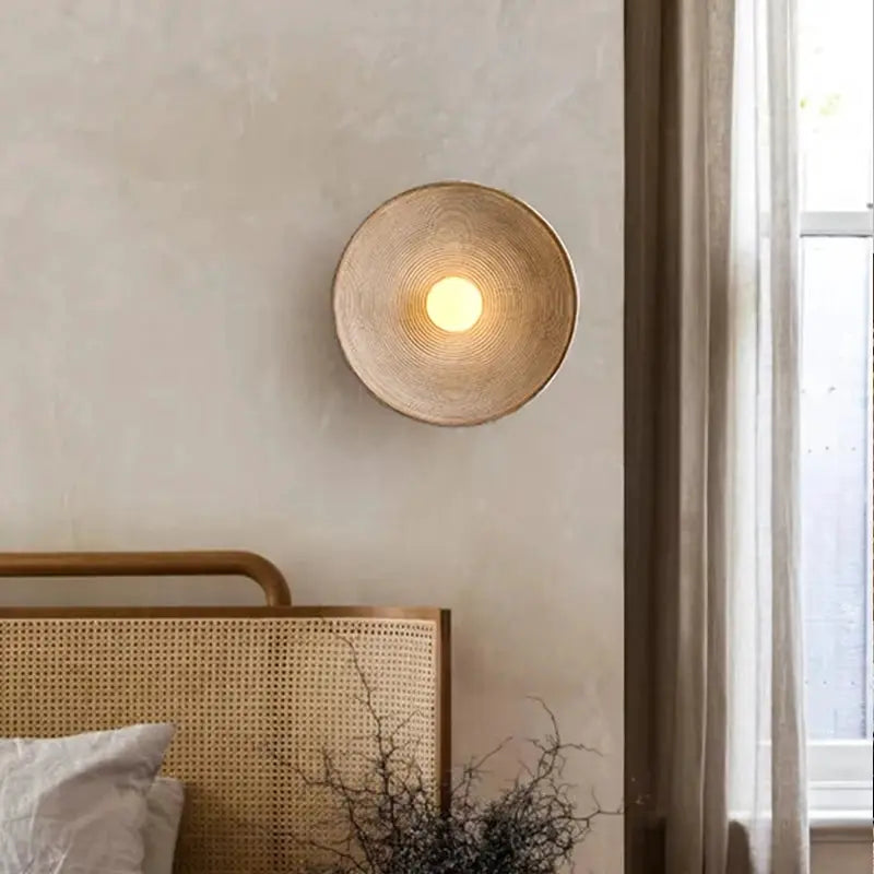 Retro Japanese Resin Wall Lamp; round beige woven shade with warm light