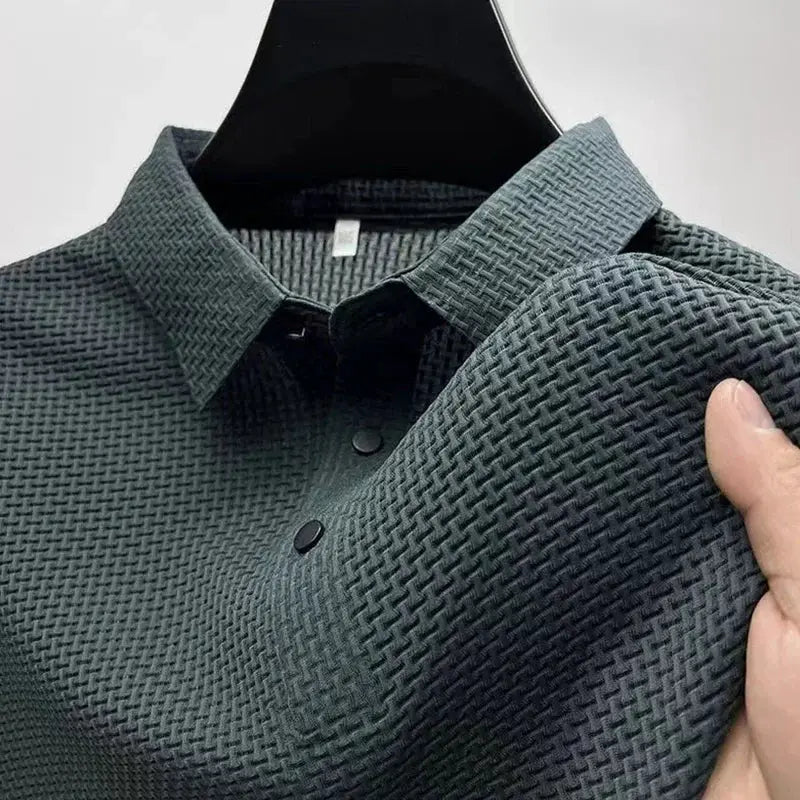 Men's polo shirt by Simples Market in dark green textured fabric with button collar.