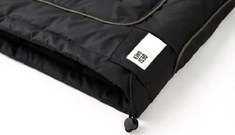 Men's black down jacket by Simples Market with drawcord hem and zipper pull