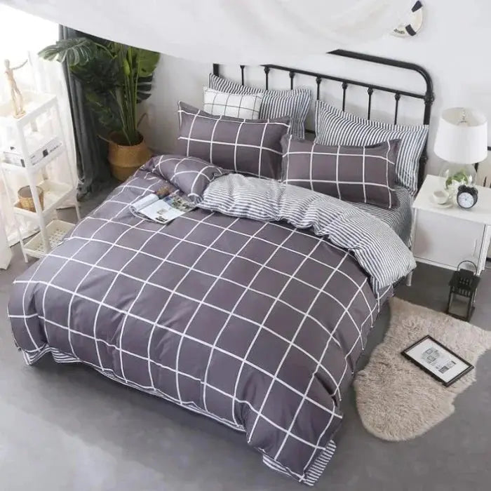 Four-piece Aloe Vera cotton bedding set in gray with white grid pattern by Simples Market