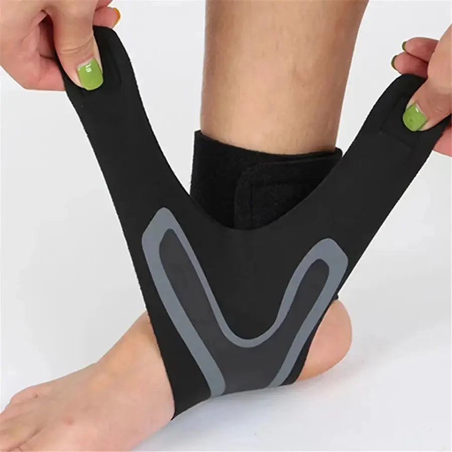 Ankle brace support compression sleeve from Simples Market, black with gray panels.