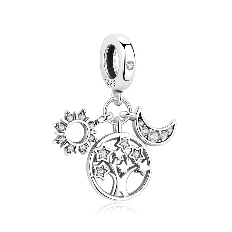 Sterling silver bracelet charms set with sun, crescent moon, tree-of-stars pendant and zircon beads by Simples Market