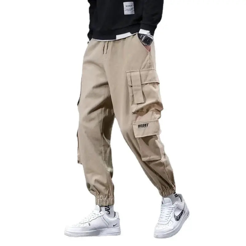 Men's tan cargo pants by Simples Market with side pockets, drawstring waist, and elastic cuffs