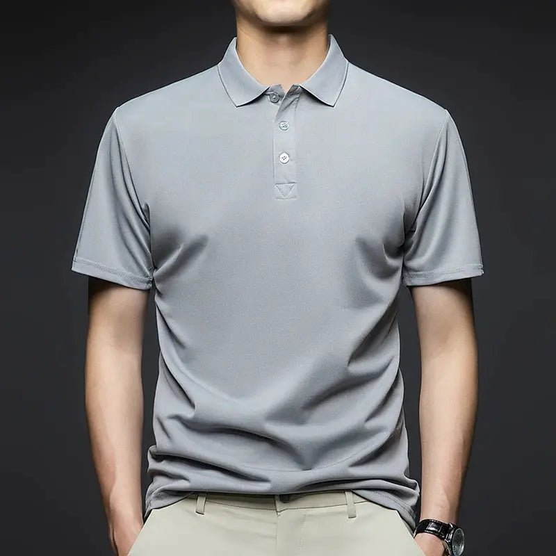 Men's solid short-sleeved polo shirt in light gray, breathable fabric.