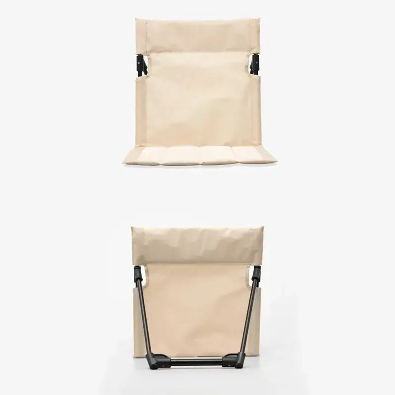 Foldable camping chair with backrest cushion, beige fabric and black metal frame