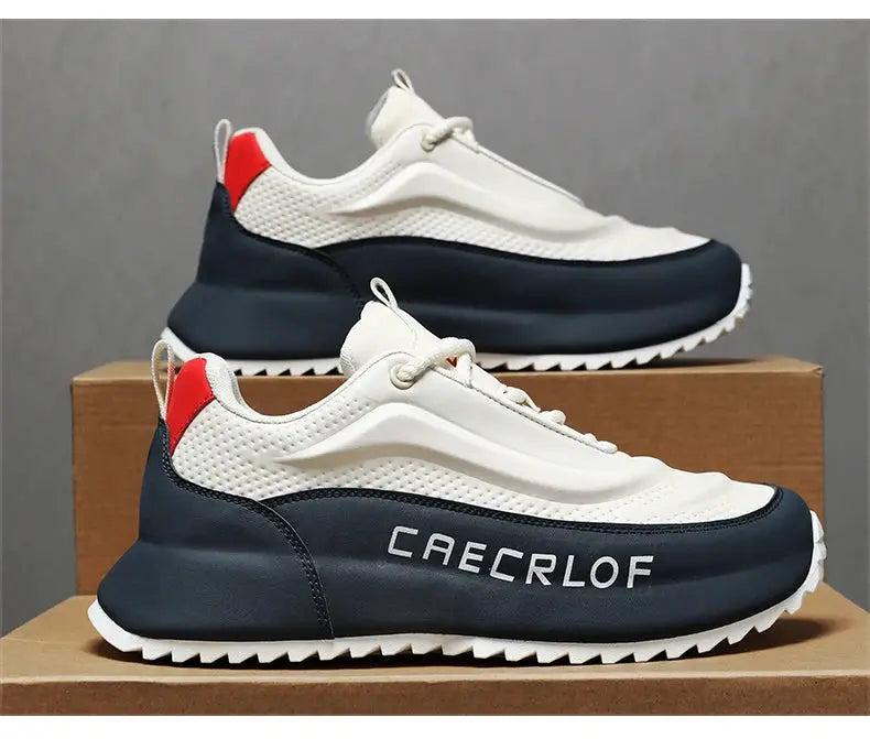 Pair of men's lightweight running shoes in white and navy with red heel accent, CAECROF branding, breathable non-slip sole