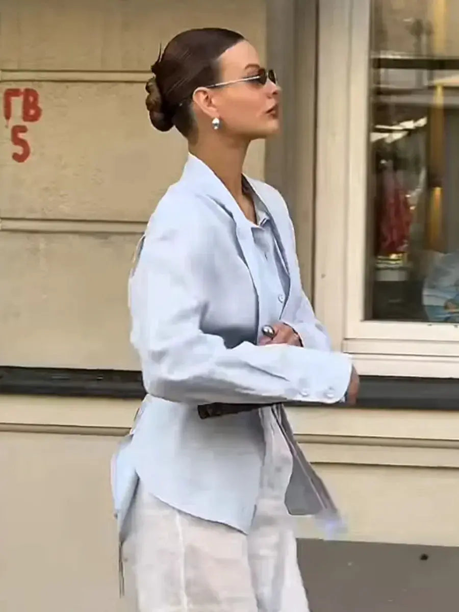 Light blue 100% cotton tie-belted shirt cardigan for women with floating ribbon detail.