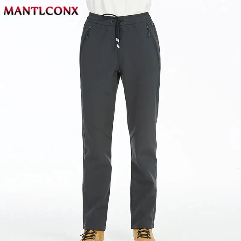 Breathable men's casual jogger pants, charcoal gray, elastic waist with zip pockets, MANTLCONX logo