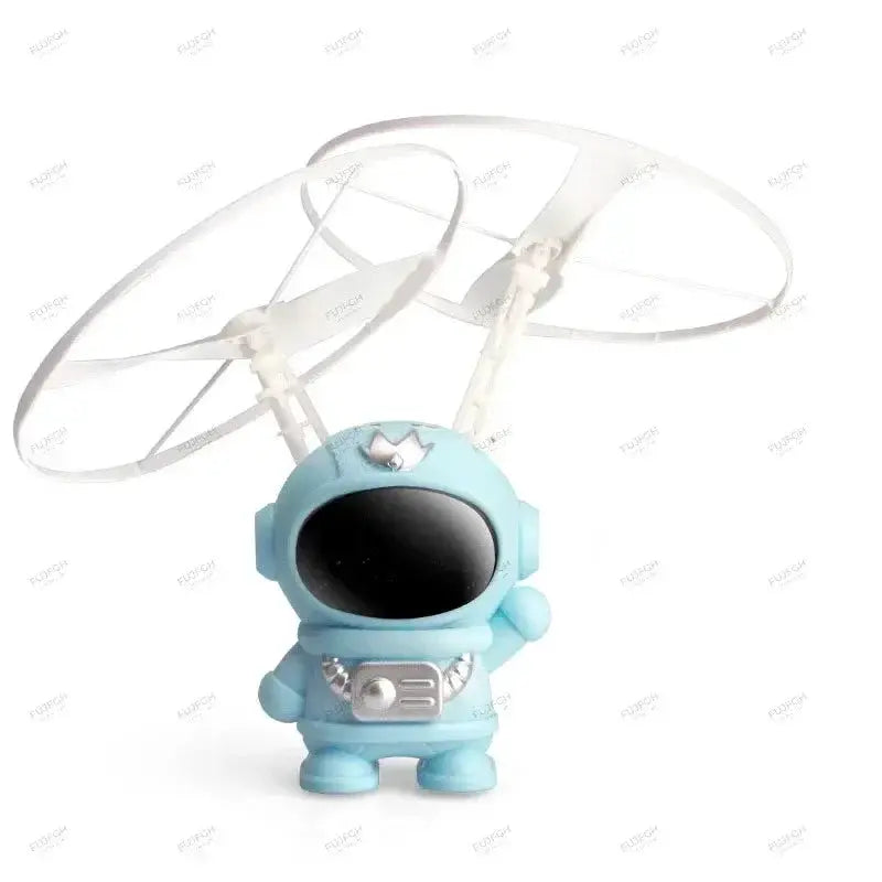 Levitating blue astronaut toy drone with clear rotor rings and lights.