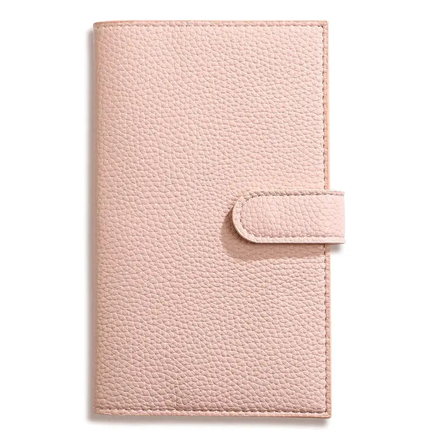 Simples Market A6 weekly planner notebook with pink pebble-grain leather cover and strap closure
