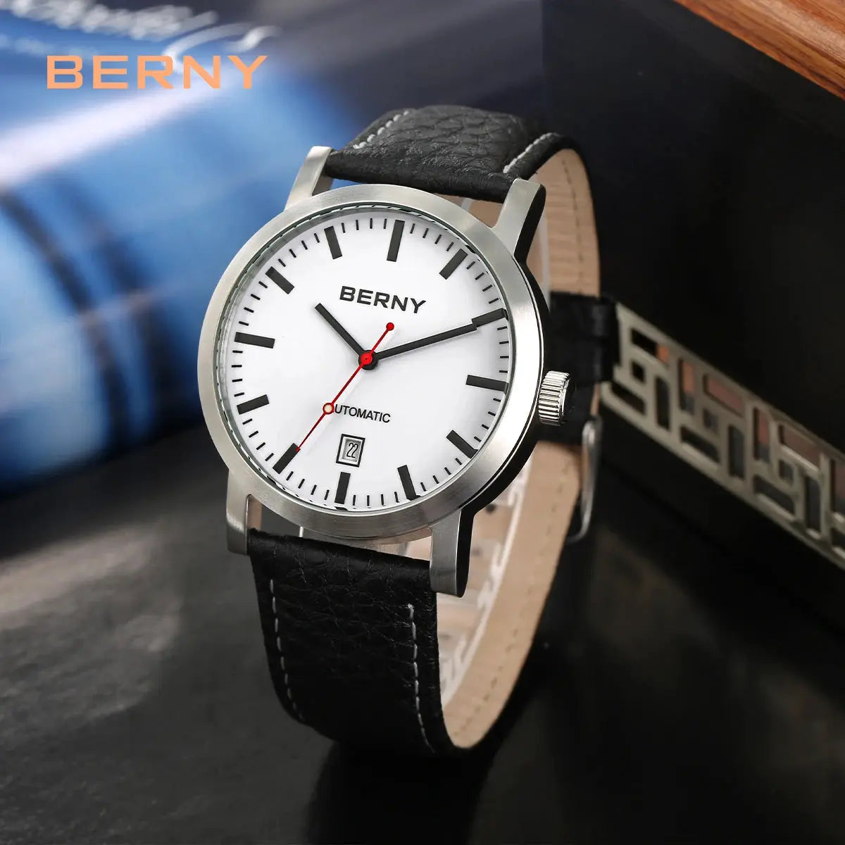 BERNY men's wristwatch with white dial, black leather strap, automatic movement, date window, 5ATM water resistant.