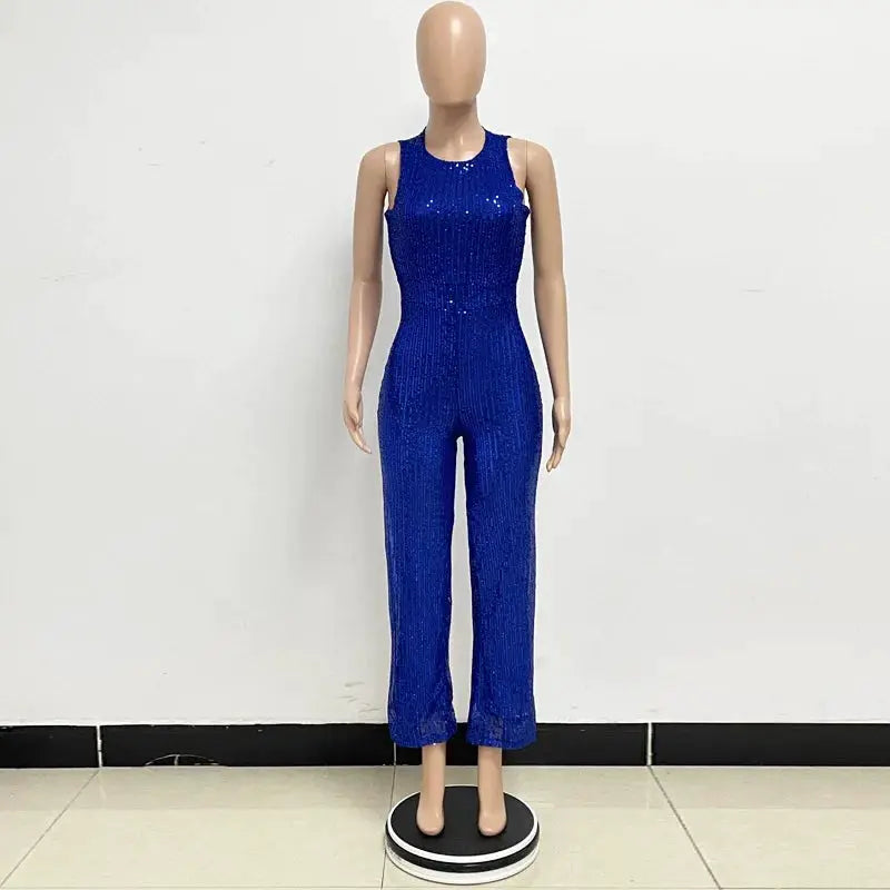 Blue sequin jumpsuit for women by Simples Market, sleeveless, high-waisted, fitted glam party wear.