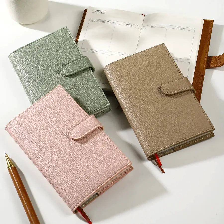 A6 Weekly Planner Notebook with compact leather covers by Simples Market in pink, sage green, taupe (3-pack)