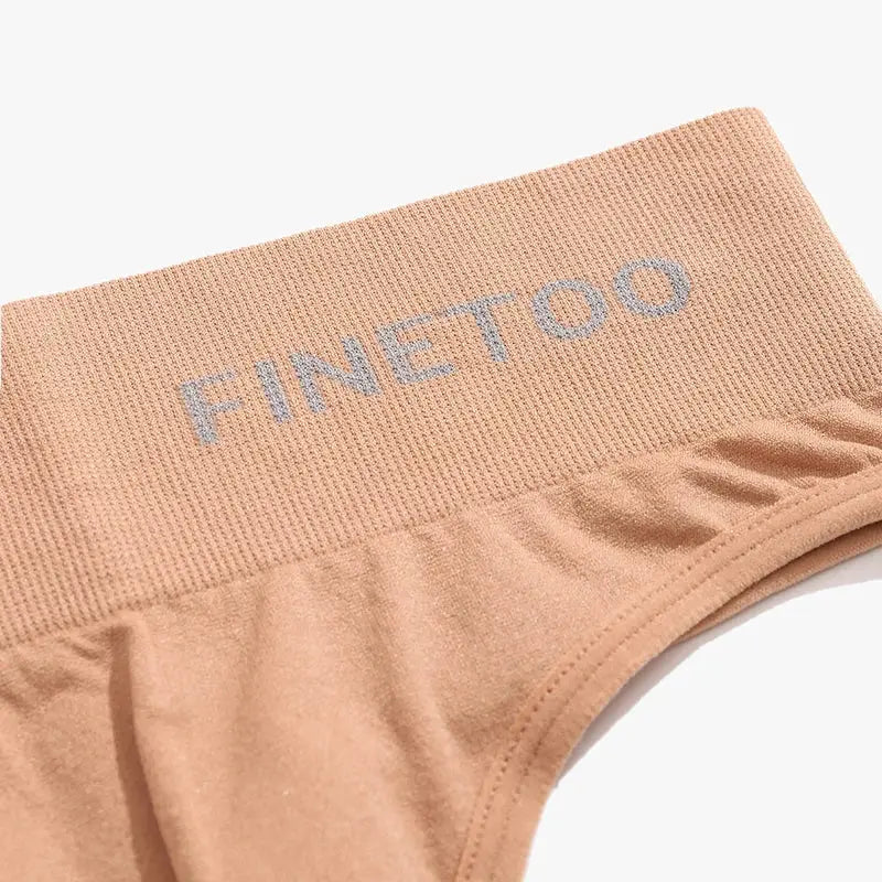 FINETOO seamless women's thong underwear waistband in peach beige, high-rise style