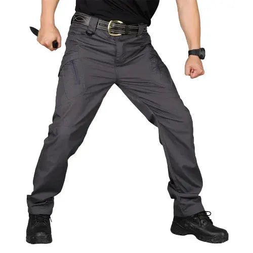 Men's tactical cargo pants in gray with multiple pockets for outdoor work.