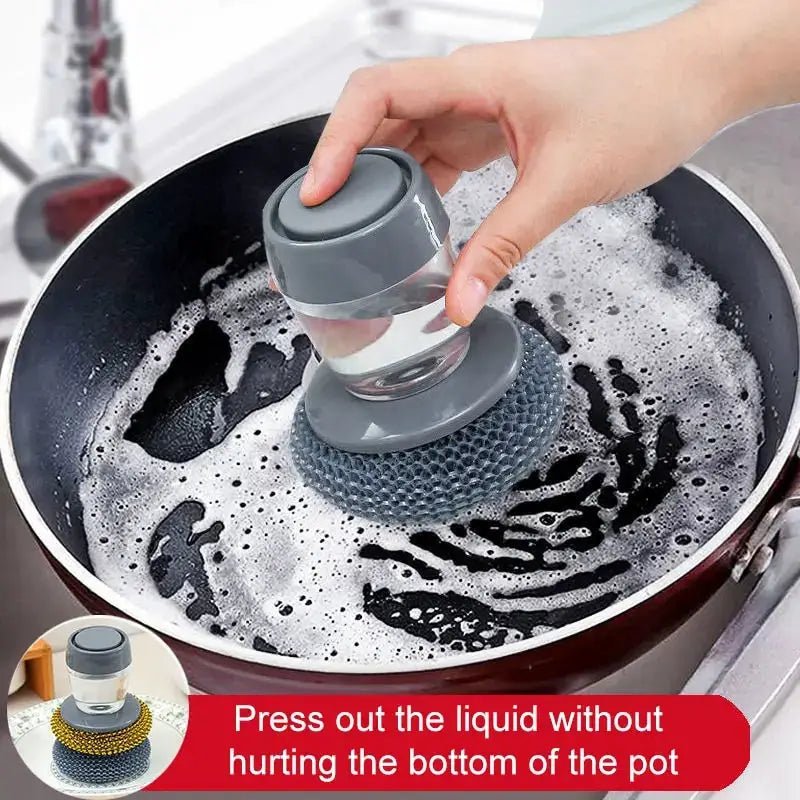Soap-dispensing dishwashing brush by Simples Market, gray handle with silicone scrubber.