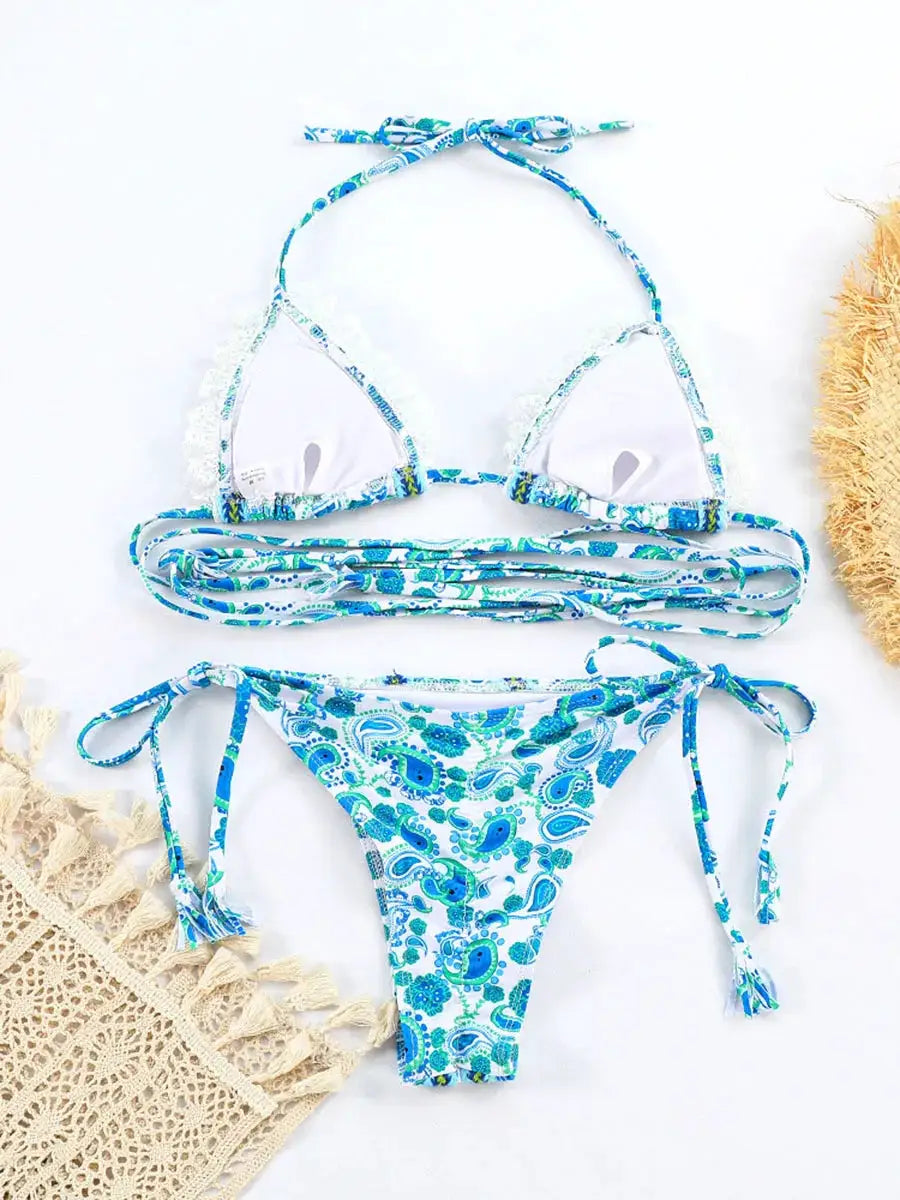 Two-piece bikini set with blue paisley print and white triangle top, adjustable string ties