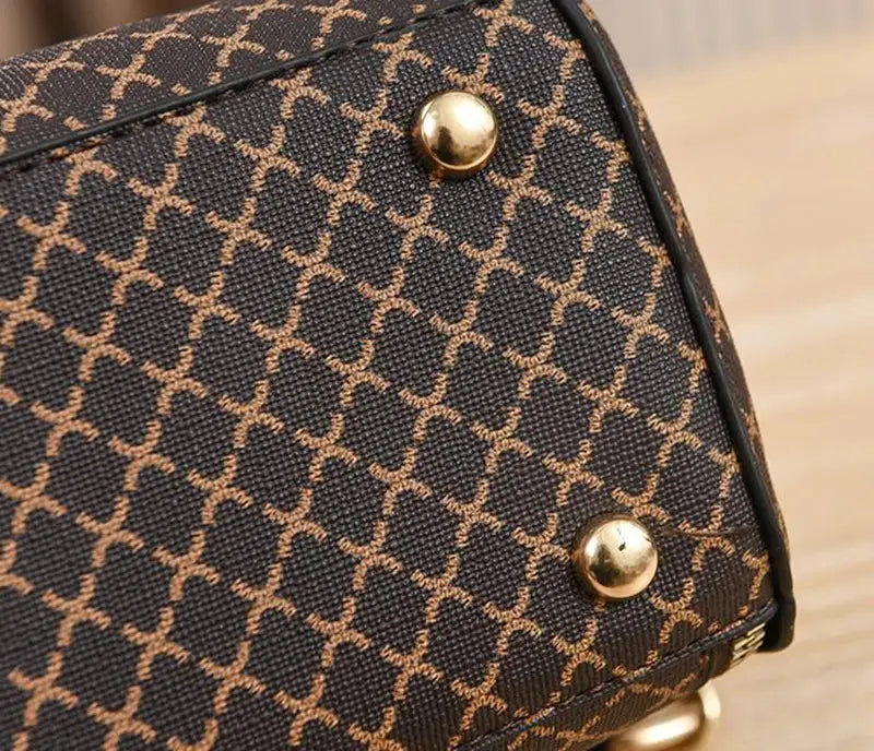 Simples Market women's handbag; luxury brown bucket crossbody with flip check print and gold-tone studs
