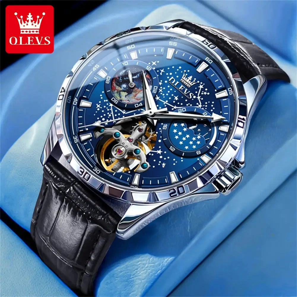 OLEVS Flywheel skeleton automatic men's watch with starry blue dial, visible gears, silver case, black leather strap.