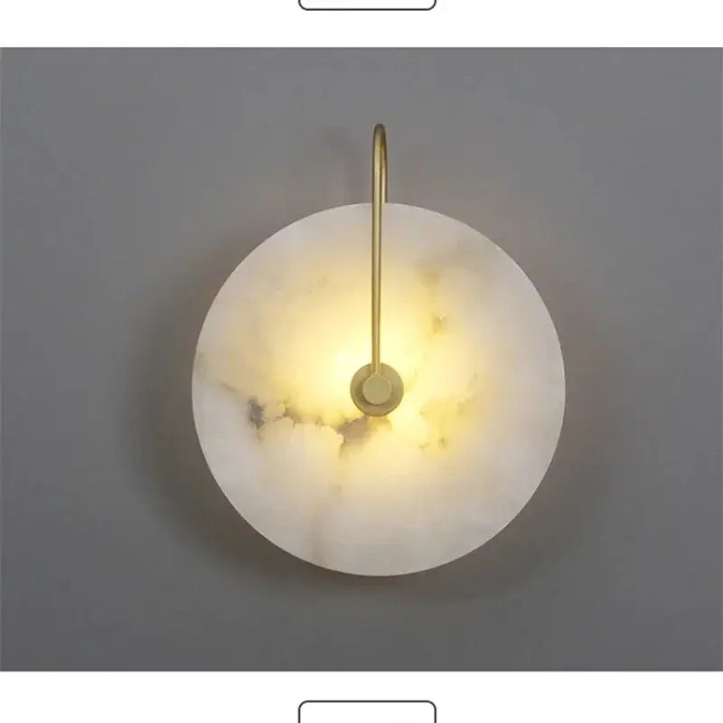 Nordic marble moon wall sconce with brass vertical stem LED light by Simples Market