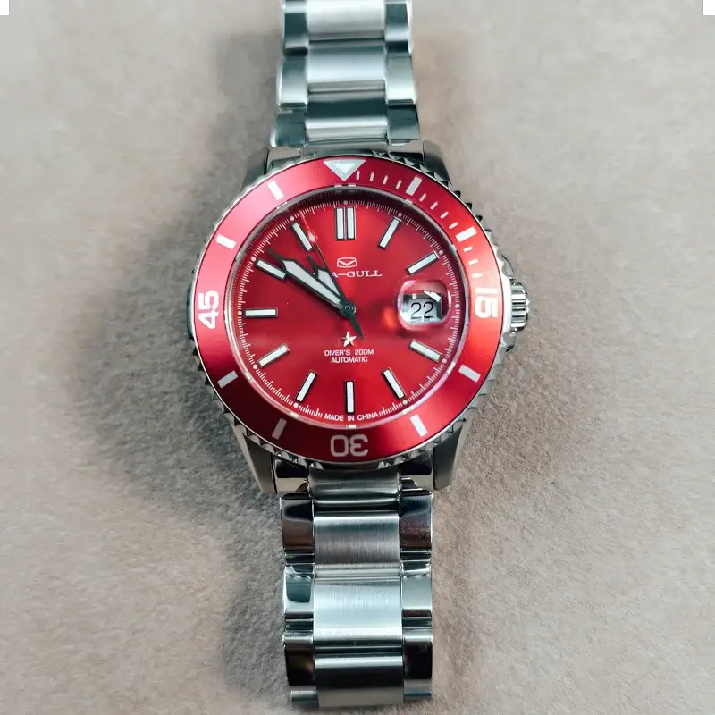 Seagull men's diving watch with red dial, stainless steel bracelet, 200m water resistant