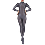 Women's metallic grey full-body jumpsuit with long sleeves and footed design