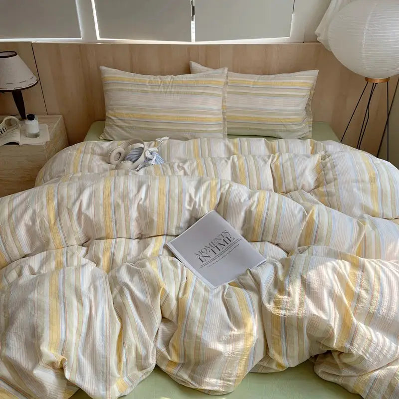 100% cotton striped bedding set with duvet cover and pillow cases in pastel yellow and blue