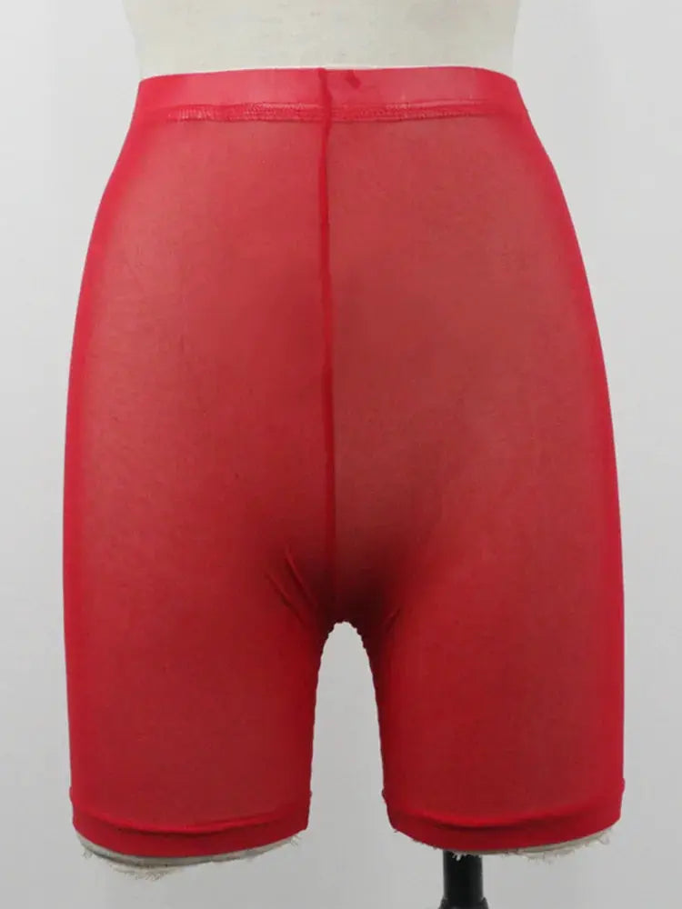 Red high-waist women's shorts on a mannequin; stretchy fabric, mid-thigh length.