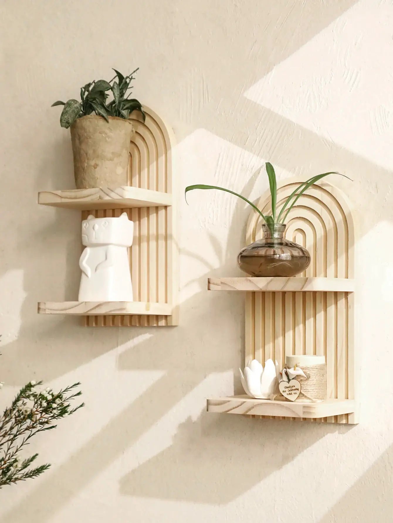Two boho-style wooden wall shelves with arched back panels in natural finish, Simples Market