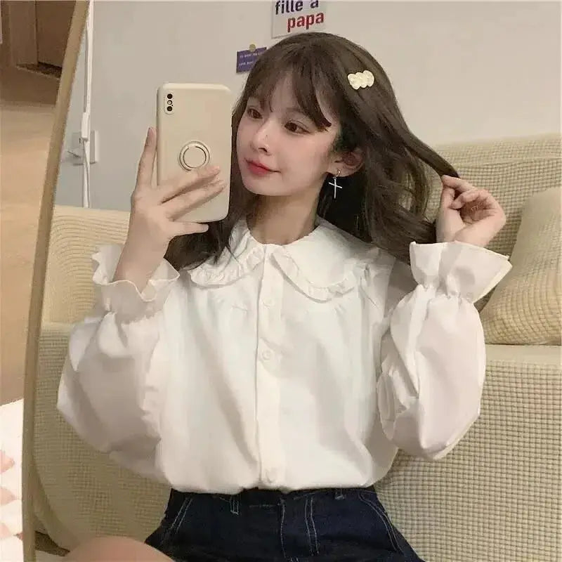Vintage white long-sleeve blouse with a frilled collar and puff sleeves, Y2K preppy style