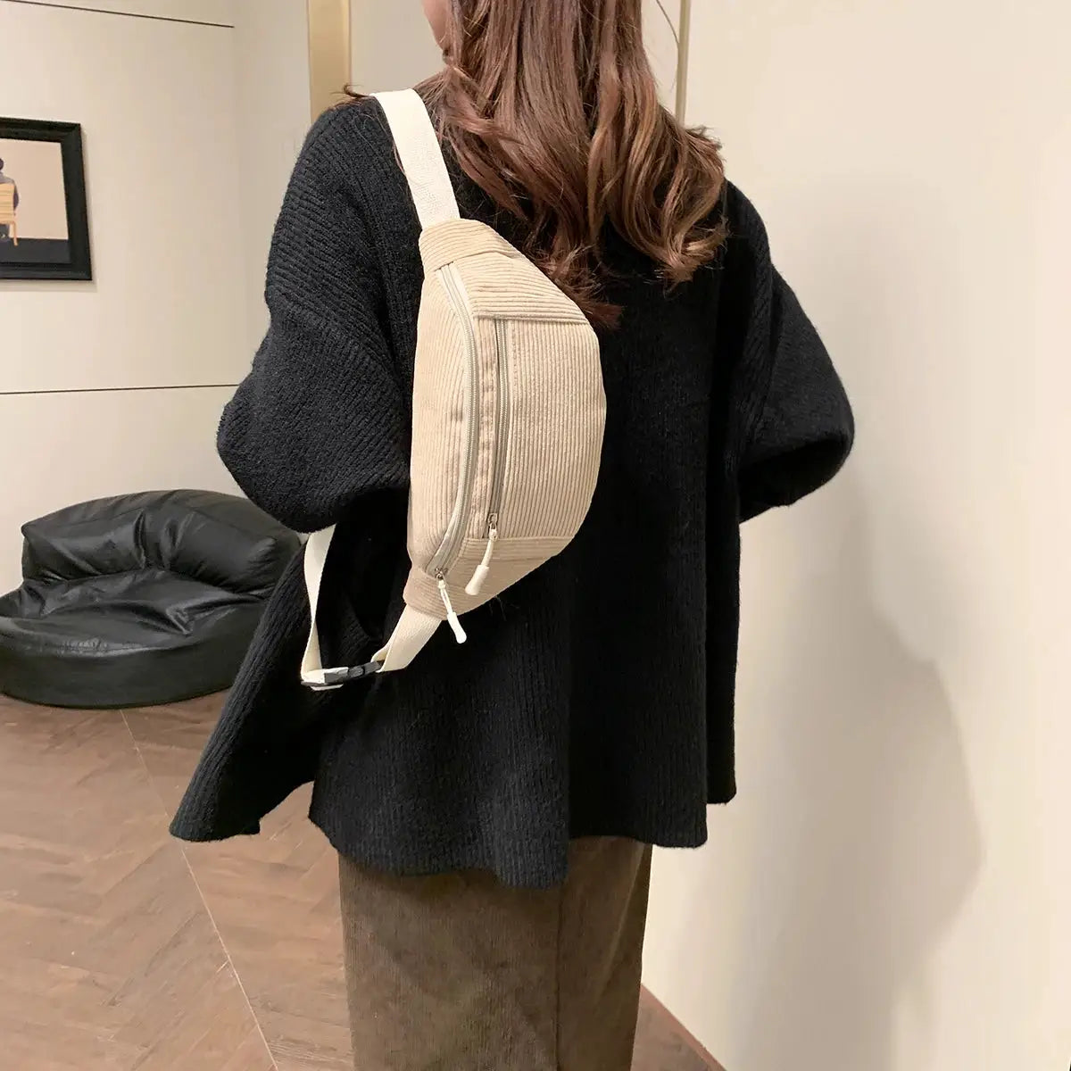 Corduroy women waist bag crossbody with beige body and cream strap.