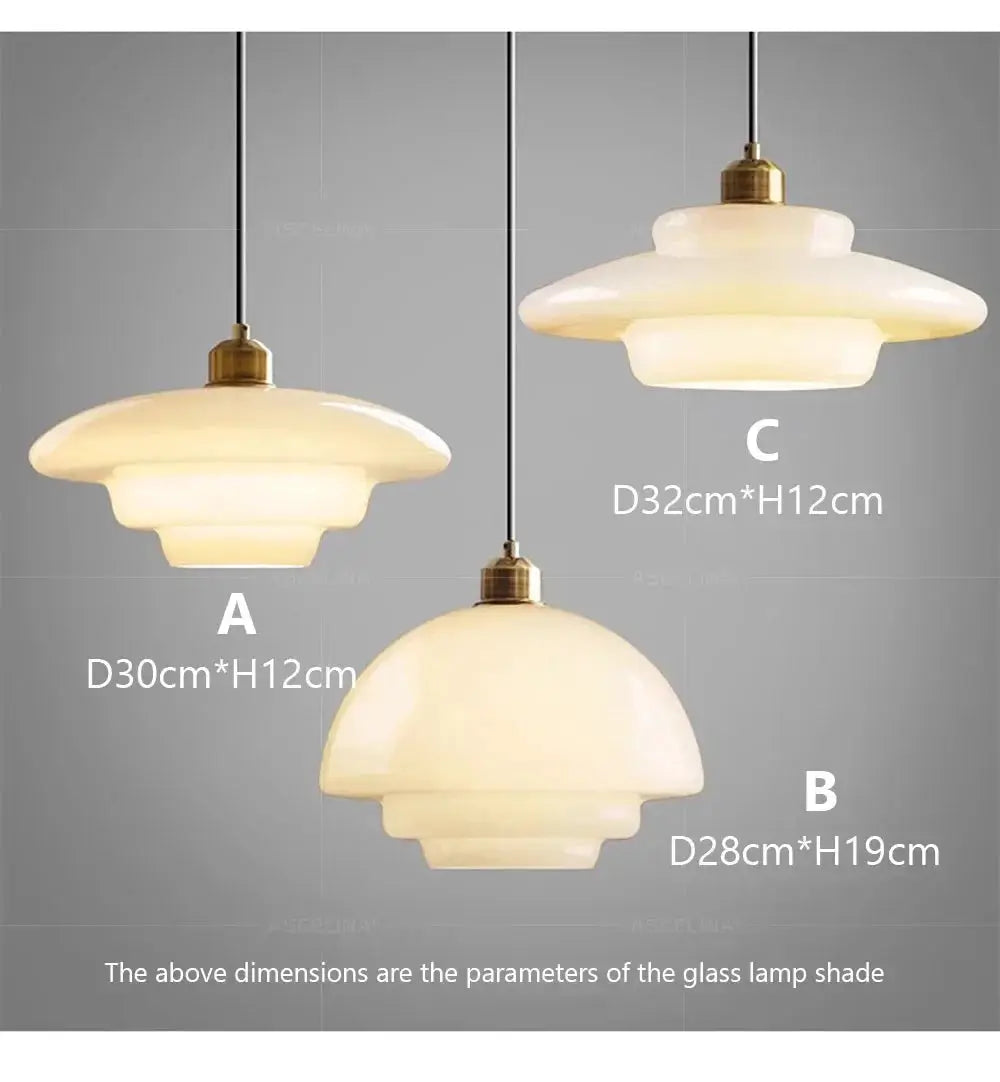 Nordic glass pendant lamps set of 3 by Simples Market; cream glass with brass fittings.