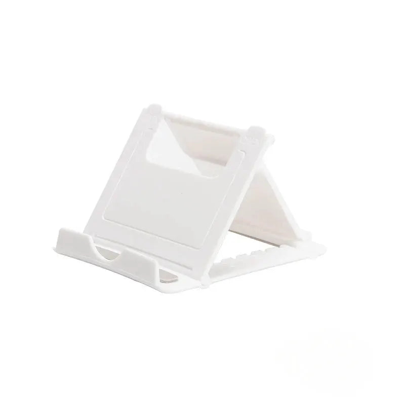 Desktop tablet folding stand by Simples Market, white plastic, adjustable and portable.