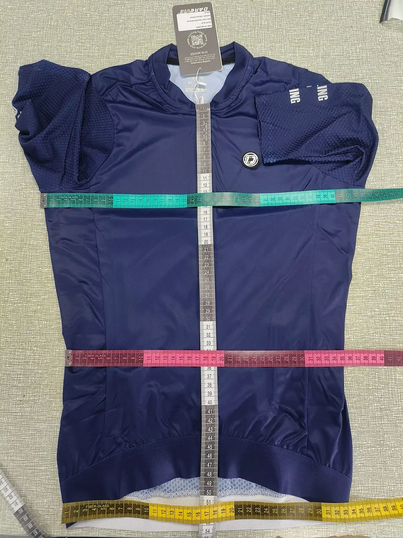 DAREVIE cycling jersey navy SPF50+ breathable fabric with puff mesh sleeves; Simples Market.