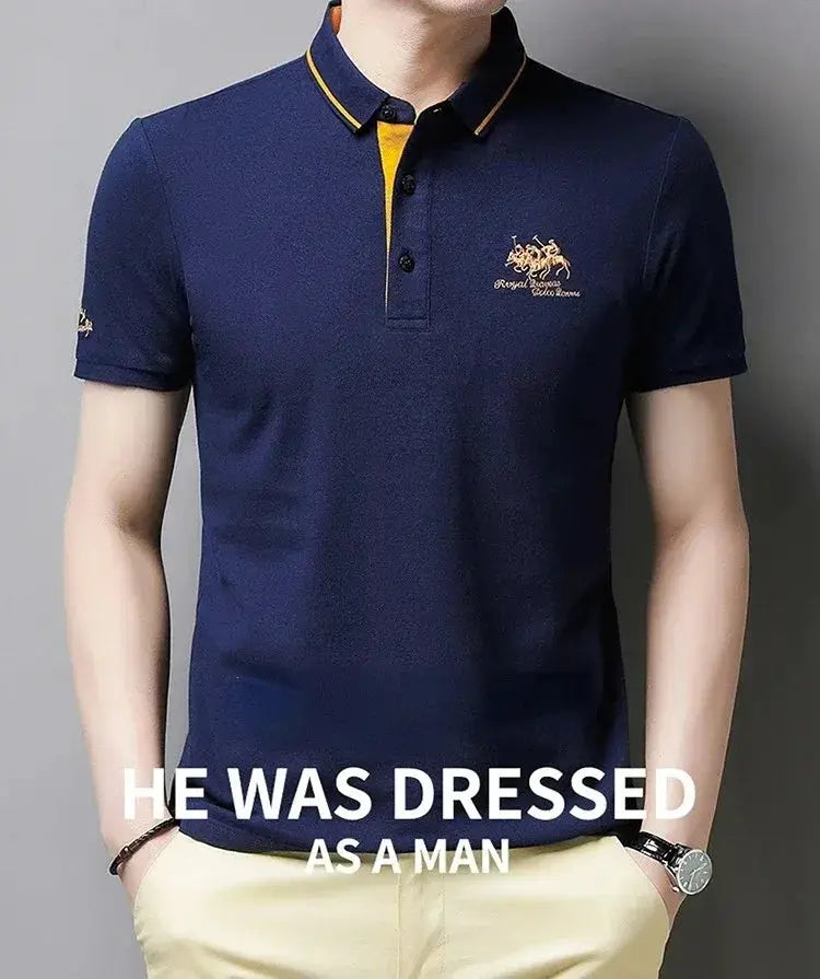 Men's navy polo shirt with yellow collar trim, left-chest embroidered crest, short sleeves, breathable lightweight fabric