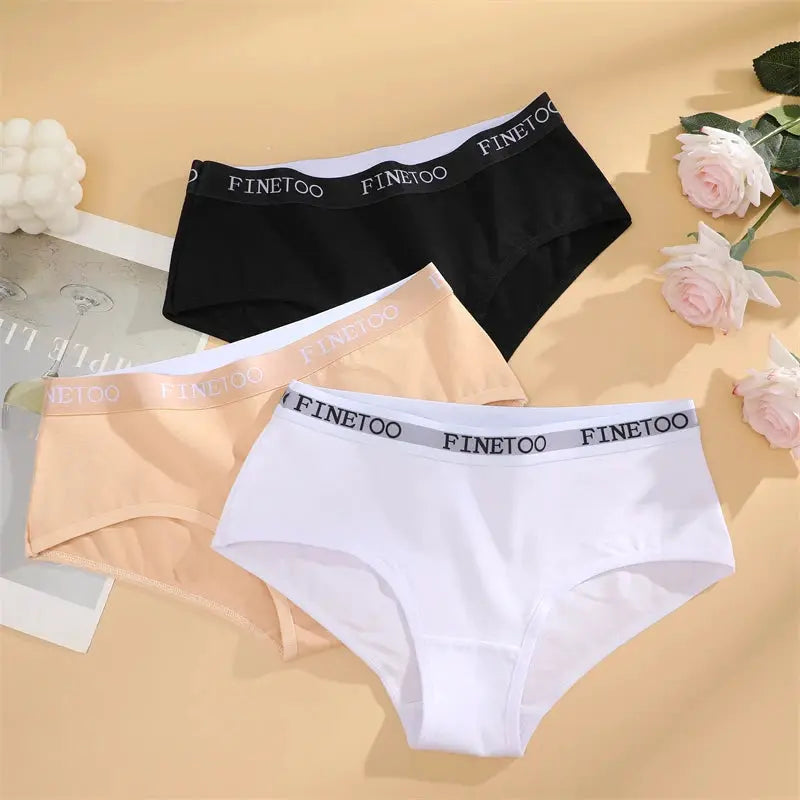 Three-pack women's cotton briefs in black, peach, and white with FINETOO waistband.