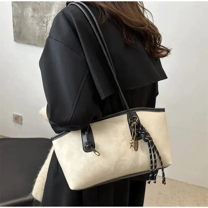 European American retro tote bag in beige with black trim, long straps and large capacity
