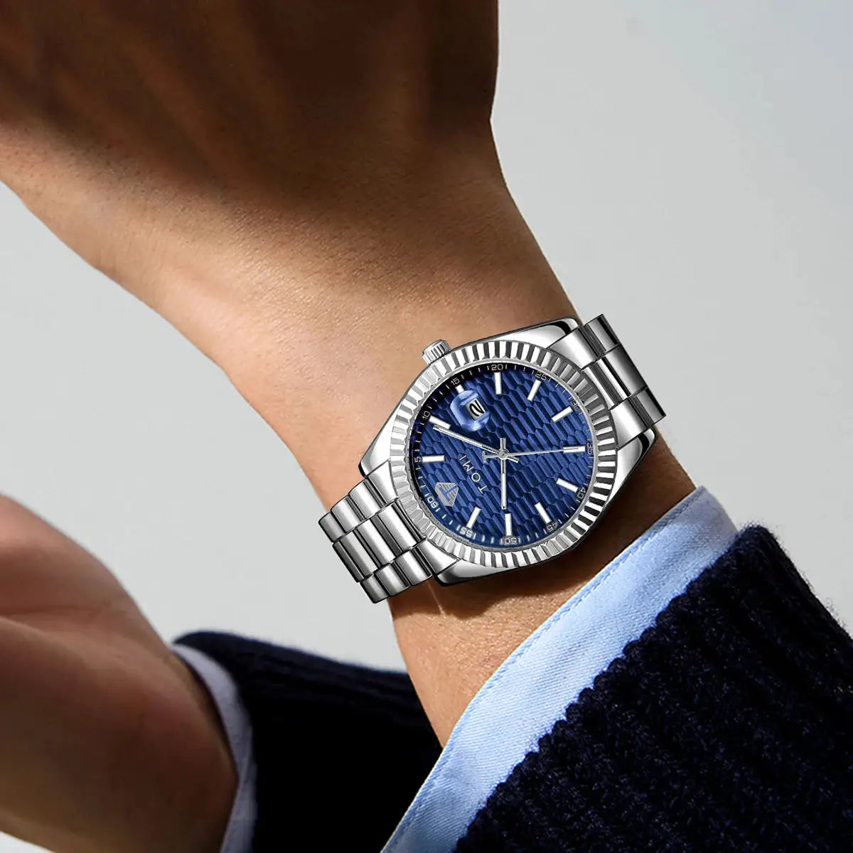 TOMI men's stainless steel wristwatch with a blue textured dial and silver band