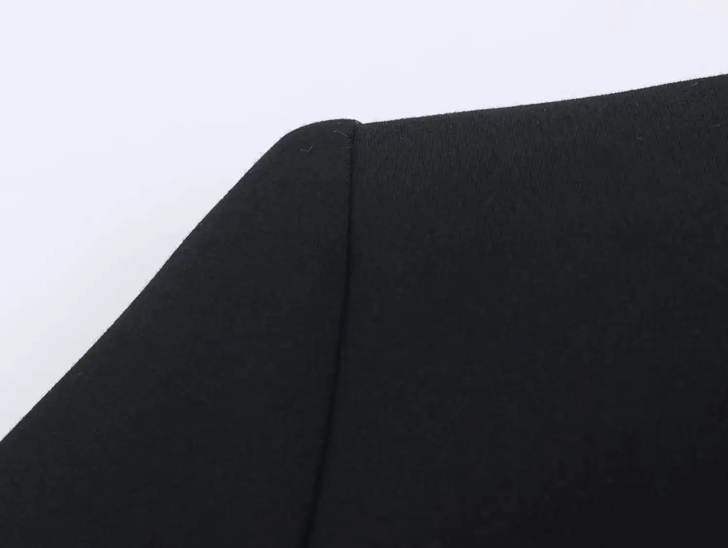 Simples Market women's black blazer from a two-piece suit set; close-up shoulder seam