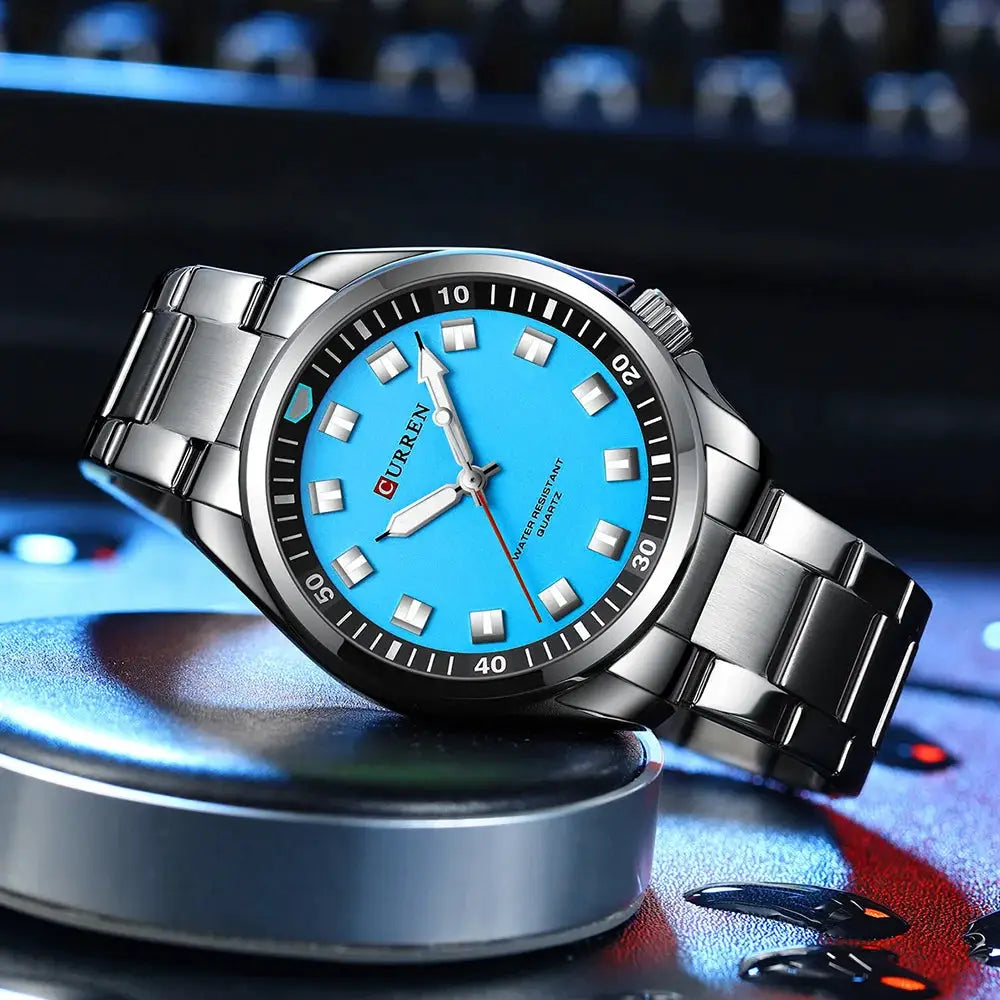 CURREN men's stainless steel watch with blue dial and silver bracelet, water resistant quartz.