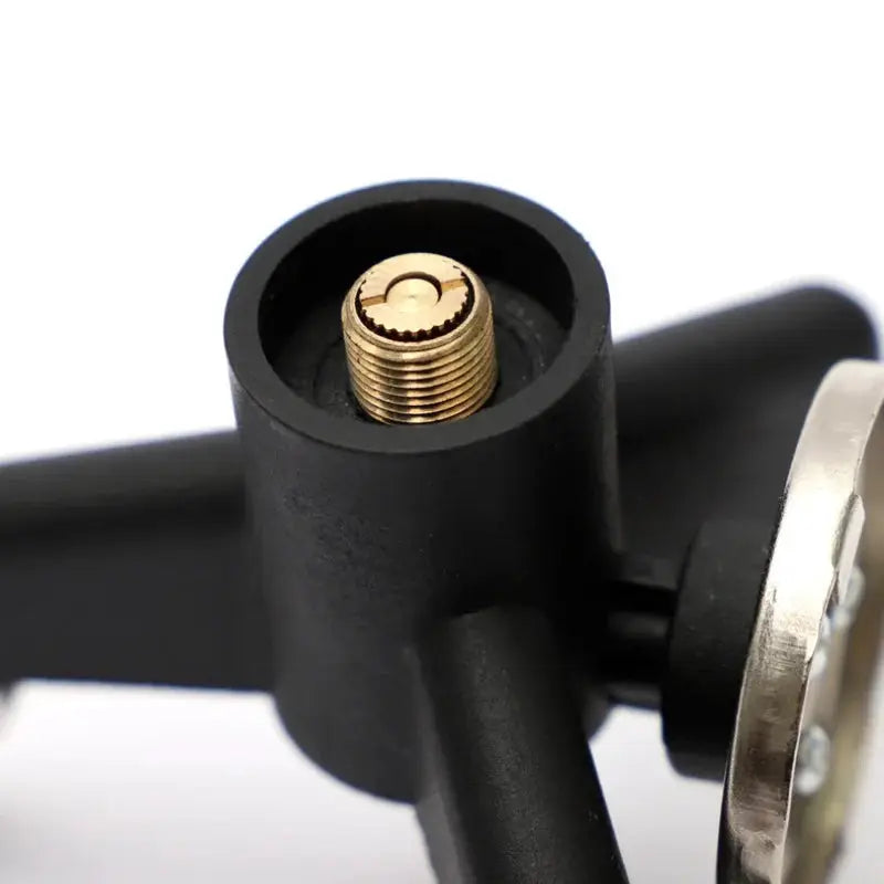 Camping gas stove adapter connector with brass threaded fitting in black plastic housing