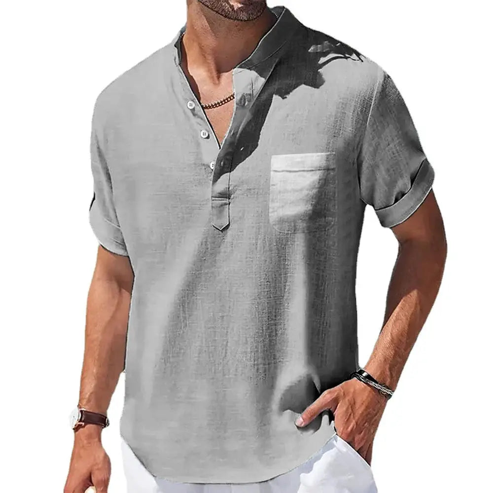 Men's light gray linen shirt with stand-up collar, short sleeves, and chest pocket.