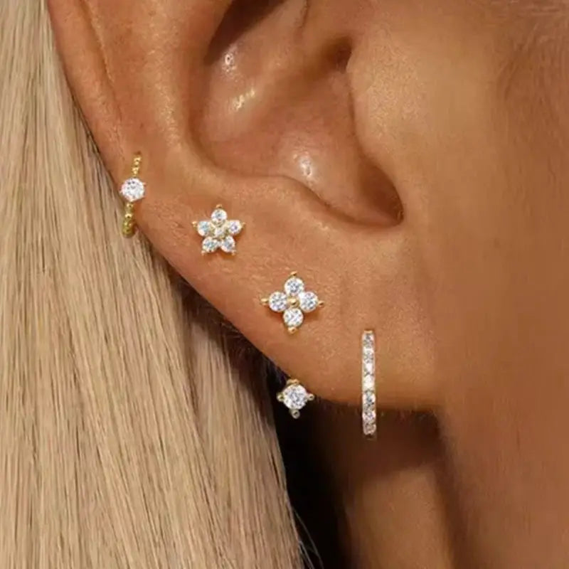 Simples Market 4pc zircon earring set for women; gold-tone flower studs, crystal hoops, and crystal bar hoop.