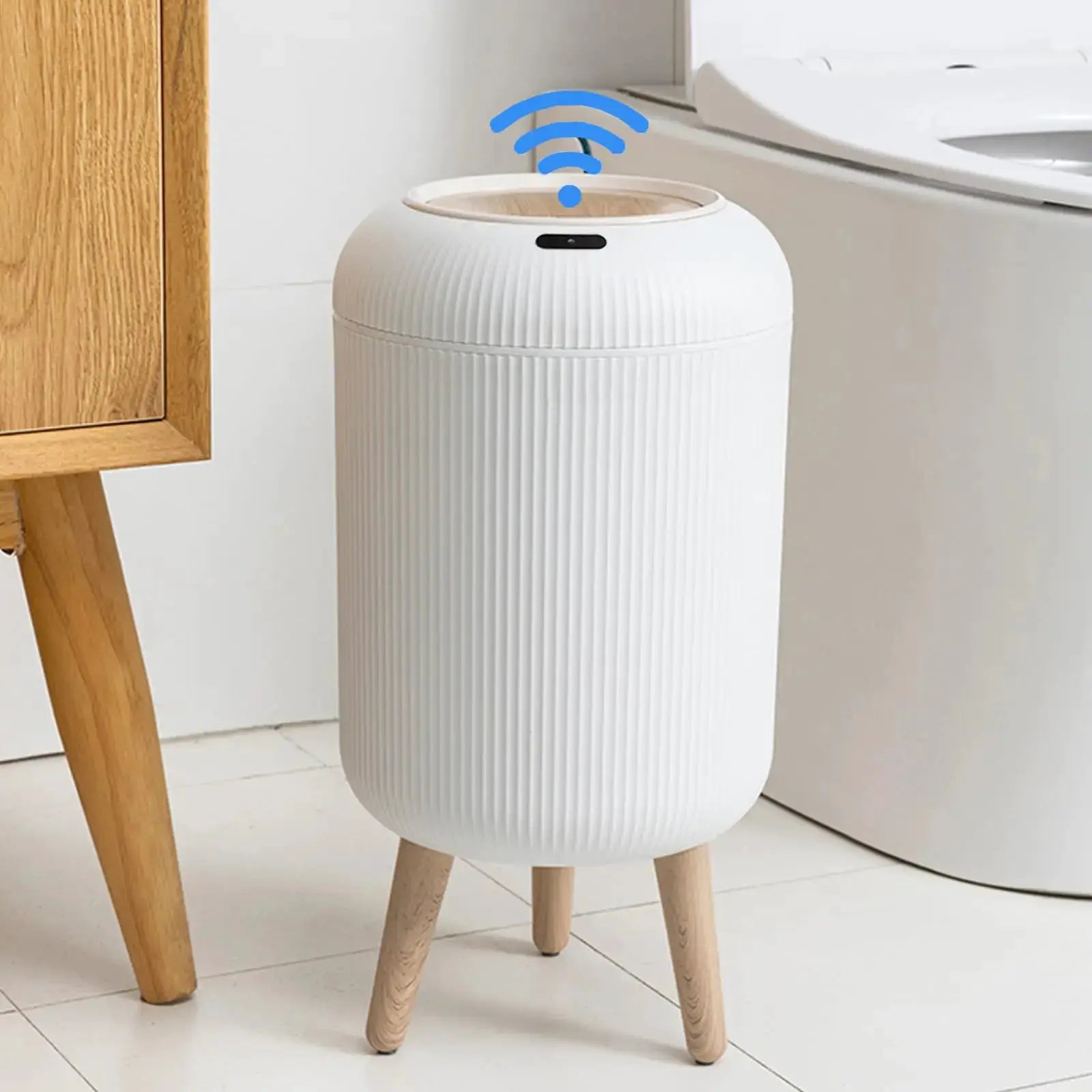 Automatic small white plastic trash can with ribbed body and wooden legs, motion sensor.