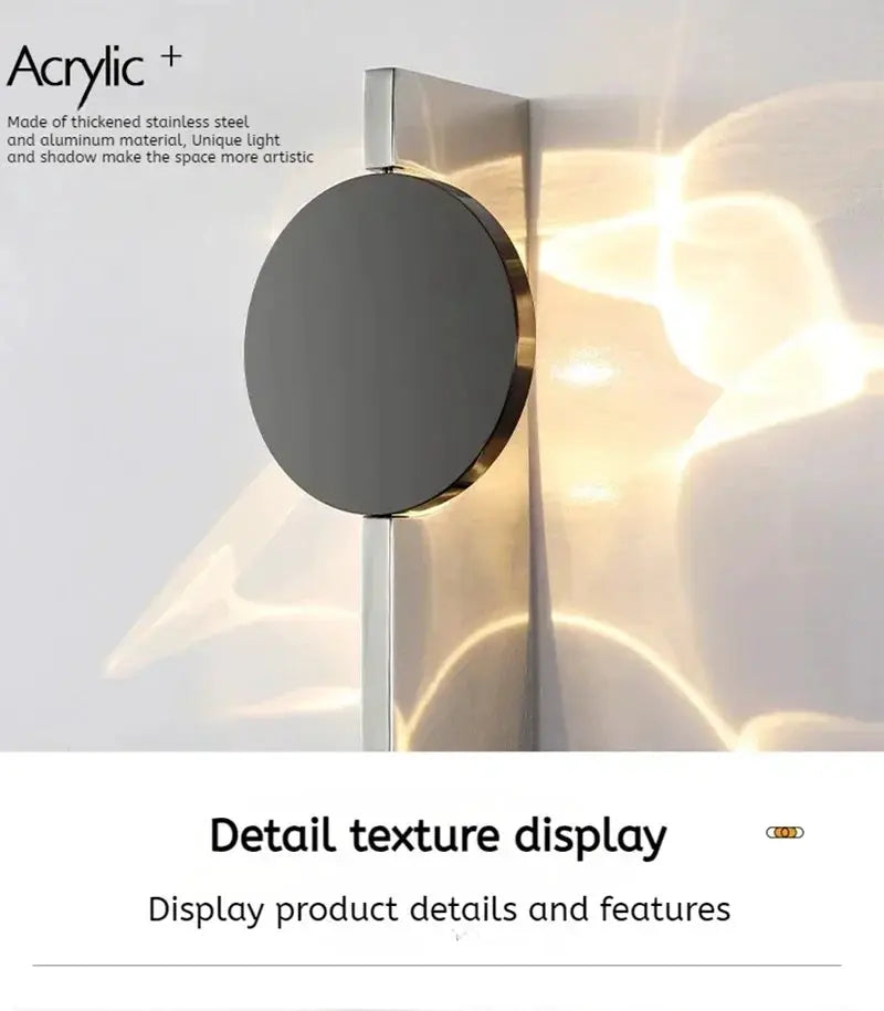 Round stainless steel LED wall light, rotatable disc with brass rim, modern hotel bedroom sconce