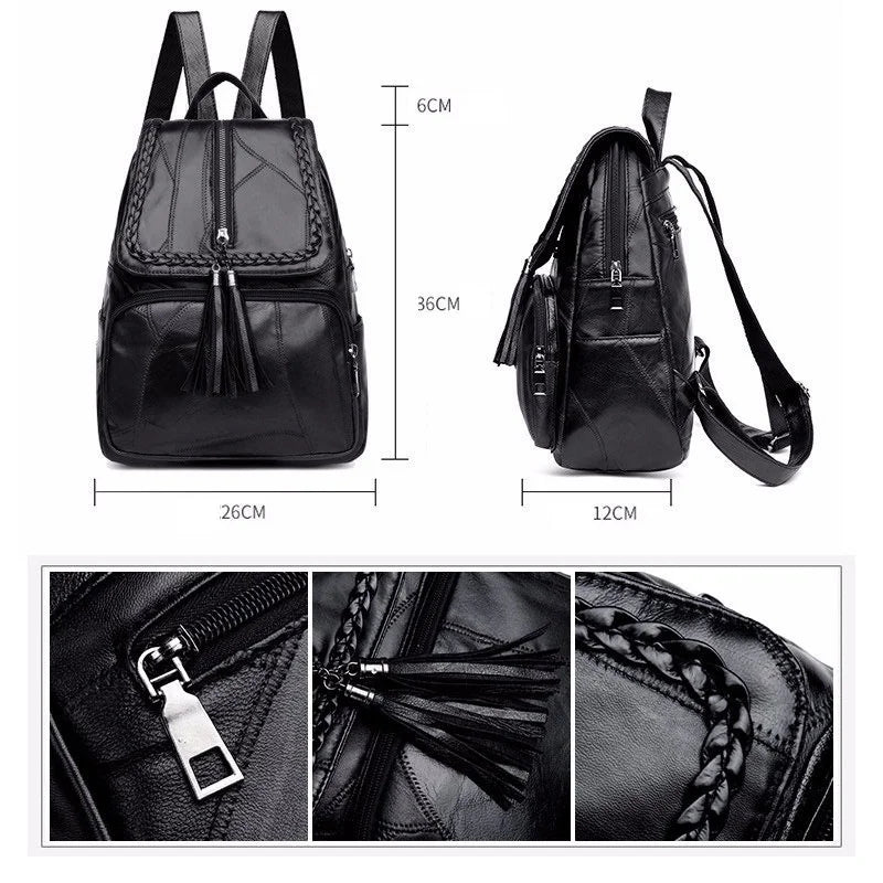 Mini black canvas backpack for men with braided front and tassel zippers; 26x36x12cm