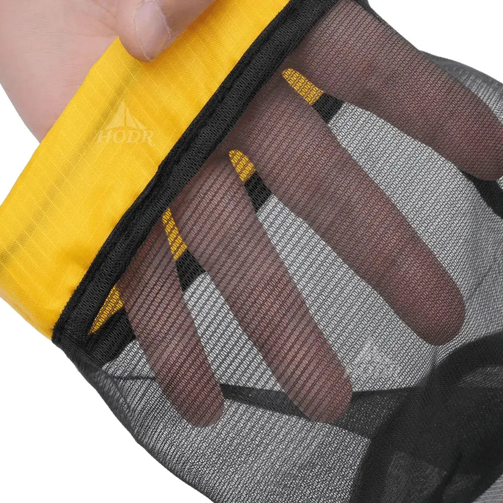 HODR mesh stuff sack by Simples Market with yellow top and gray mesh body