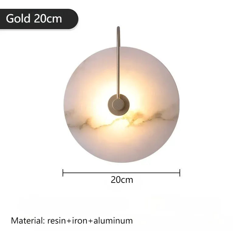 Marble wall light by Simples Market, round alabaster disc with gold finish, 20cm diameter