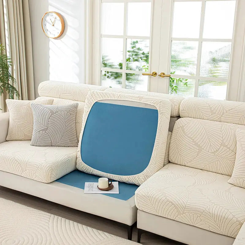 Simples Market thick plush sofa cushion cover on beige leaf-patterned sectional; blue insert visible